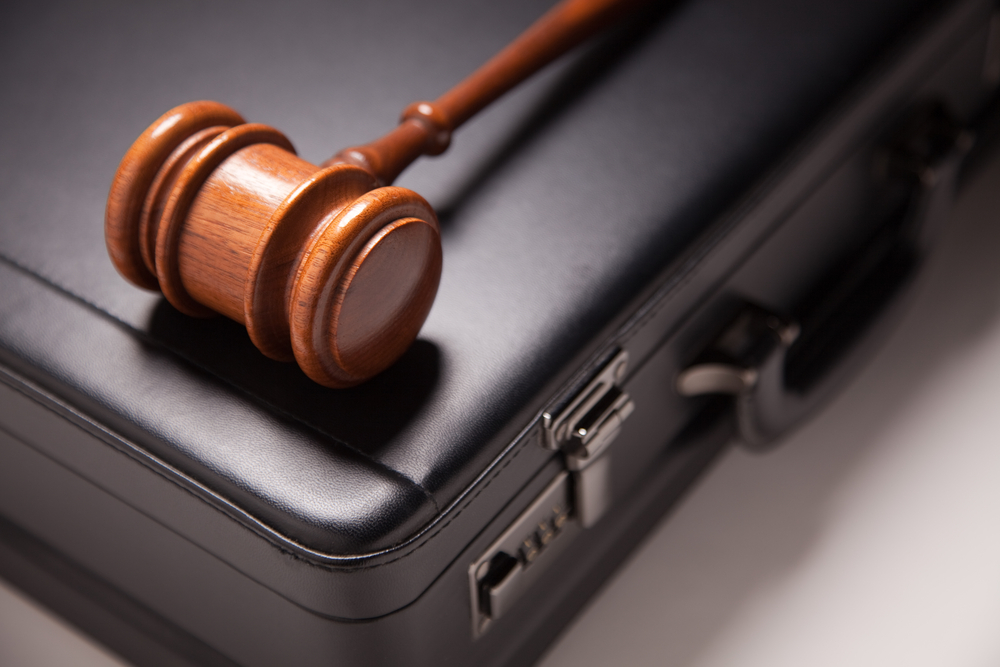 Commercial-Litigation-Lawyer-Montana-gavel-on-briefcase.jpeg