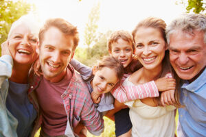 Family smiling together before working with an Estate Planning Lawyer Butte, MT